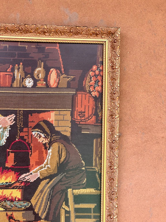 Broderie vintage encadrée – Scène rustique au coin du feu – Ambiance campagne ancienne