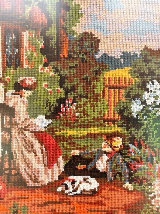 Broderie encadrée vintage – Scène romantique au jardin – Femme lisant et enfant